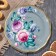 Zhostovsky tray "Multi-colored roses", dark gray, round, D = 17 cm