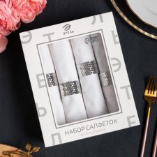 A set of napkins with a decorative. Rings 