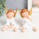 Souvenir Polystone "Angel in a white dress, sits" golden wings mix 10x9x13 cm