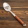 Serving spoon-shumovka with a wooden handle 35 cm, scooped 10x7 cm