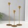 Summary Metal "Ball with faces" Dark gold d = 2 cm, set 3 pcs h = 32 cm, 27 cm, 22 cm