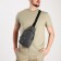 Male sling bag from textiles, headphone opening, gray color