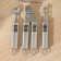 A set of kitchen instruments "DENI", 6 items, on a stand, silver color