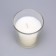 Candle in a smooth glass flavored "white lily", 8.5 cm