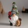 Polystone souvenir "Dwarf in a hat with cones, with a hedgehog and candy" 5.5x4.5x10.5 cm
