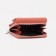 Women's wallet on the button, orange color