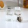 A set of glass spices on a stand, 4 items: a solo, a lobby, a napkin, a tank capacity