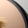 Wall mirror in a round case made of metal, d = 60, black ruby