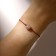 Bracelet of desires "Pink" on the burgundy thread, the length is regulated