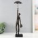 Polystone souvenir "Man with an umbrella. Flight" for metal 10.8x10.4x44.6 cm