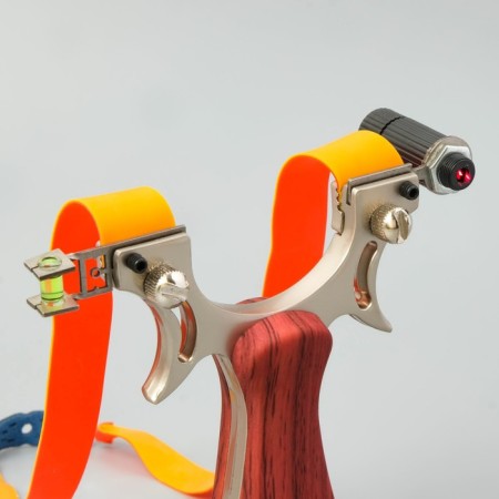 A slingshot with a wooden pen, with a laser target designator-1