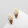 Earrings plastic "Horn" vanilla, white-brown color in silver