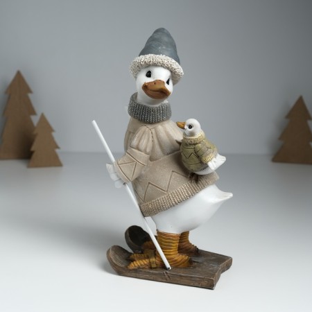 Polystone souvenir "Goose skiing, with a goose on the back" gray-beige 9.5x13.5x23.5 cm