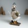 Polystone souvenir "Goose skiing, with a goose on the back" gray-beige 9.5x13.5x23.5 cm