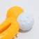 Two -layer toy (hard and soft plastic) "curved bone", 13 cm yellow