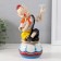 Souvenir Ceramics musical "Clown with butterfly and flower, sits on a cup" 9.5x10x18 cm