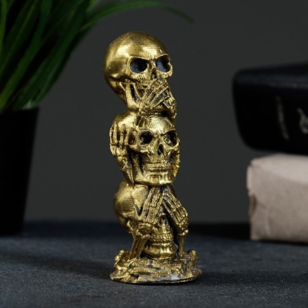 Figure "Three Skulls" aged gold, 10x4x4cm
