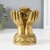 NECKE Polystone for bronze "Coins and ingots in the palms" 7.7x10.7x14 cm
