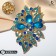 Brooch "Empress" dew, blue color in gold