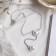 Pearls with pearls “chain” Olympia, two beads with a chain, white color in silver, 32 cm