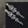 Clips "openwork" drops with curls, white color in silver