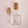 Perfume bottle, with a spray, 15 ml, golden color