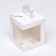 Confectionery packaging with a terminal, white, 12.5 x 12.5 x 15 cm