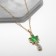 Piece "Liszt" with a drop, the color is green-white in gold, 40 cm