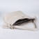 Luggage bag on lightning, 2 external pockets, milk color