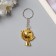Metal key "Globe" mix 4x3x0.8 cm