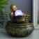 Herberry fountain with backlight "Little Buddha with a bag" 16x16x18 cm