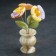 Souvenir flower in a pot of "Anyutin Eyes", onyx