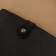 The fastener is sewn for a bag, on a button, made of genuine leather, 13.5 × 2.5 cm, black/silver color