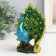 Polystone souvenir "Green peacock with a magnificent tail" 11.5x6x12 cm