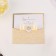 A wedding invitation with the ribbon "for our wedding"