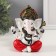 Polystone souvenir "Ganesha in the lotus pose, in red trousers" 10x10x12.5 cm