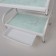 Cosmetologist table 52 × 32 × 80, on wheels ×, 3 shelves, white color (pattern on the glass of mix)