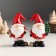 Suvenir Polystone "Santa Claus in a red cap with a Christmas tree/gift" mix 5x3.8x8.2 cm