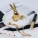 Supply Universal Ceramics "Rabbit" 13x12, white-golden color