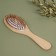 Massage comb, 22.5 × 7 cm, beige color