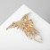 Brooch "Firebird", colored in gold
