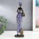 Souvenir Polystone "African Amadi with a jug" Blue Dress with MIXs 33x9x6.5 cm patterns