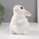 The piggy bank "Rabbit No. 3 is white (paws down)" height 16 cm, width 10.5 cm, length 12.5 cm