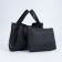 Bag Women's Tout on the button, a cosmetic bag with a zipper, black color
