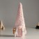 Interior doll "Granny in a fur pink cap with stars and sleds" 32 cm