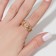 Ring "Trend" pigtail, color gold, dimensionless