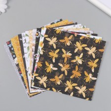 A set of scrapbooking paper 12 sheets 12 designs 