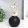 Souvenir Polystone "Abstraction. Man on the ball. Thoughts" Gold with black 10.5x10.5x25.5 cm