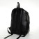 City backpack on a zipper, black color