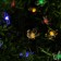 Garland “thread” 4.5 m with nozzles “chamomile”, IP44, dark thread, 30 LED, glow of multi, 2 modes, solar battery